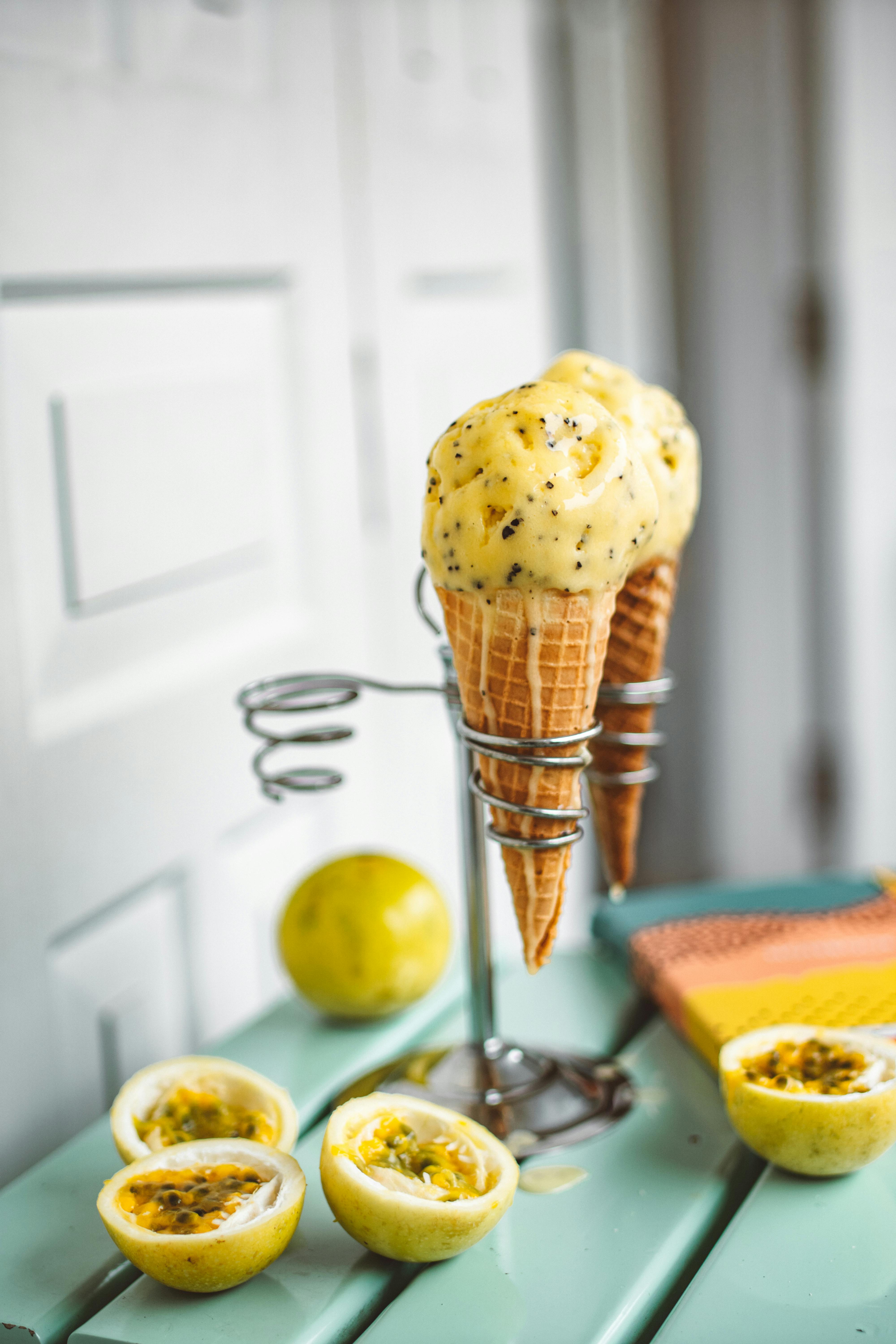 Refreshing homemade passionfruit sorbet in a bowl with mint garnish